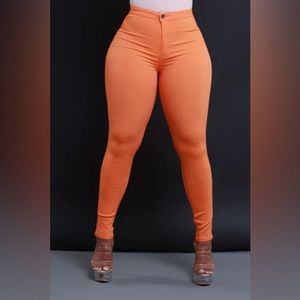 Beautiful and stylish Orange high waisted Swank jeans
